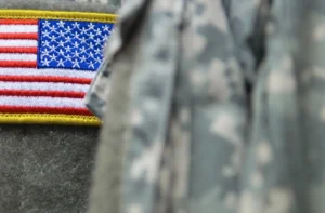 U.S. flag patch on military uniform.